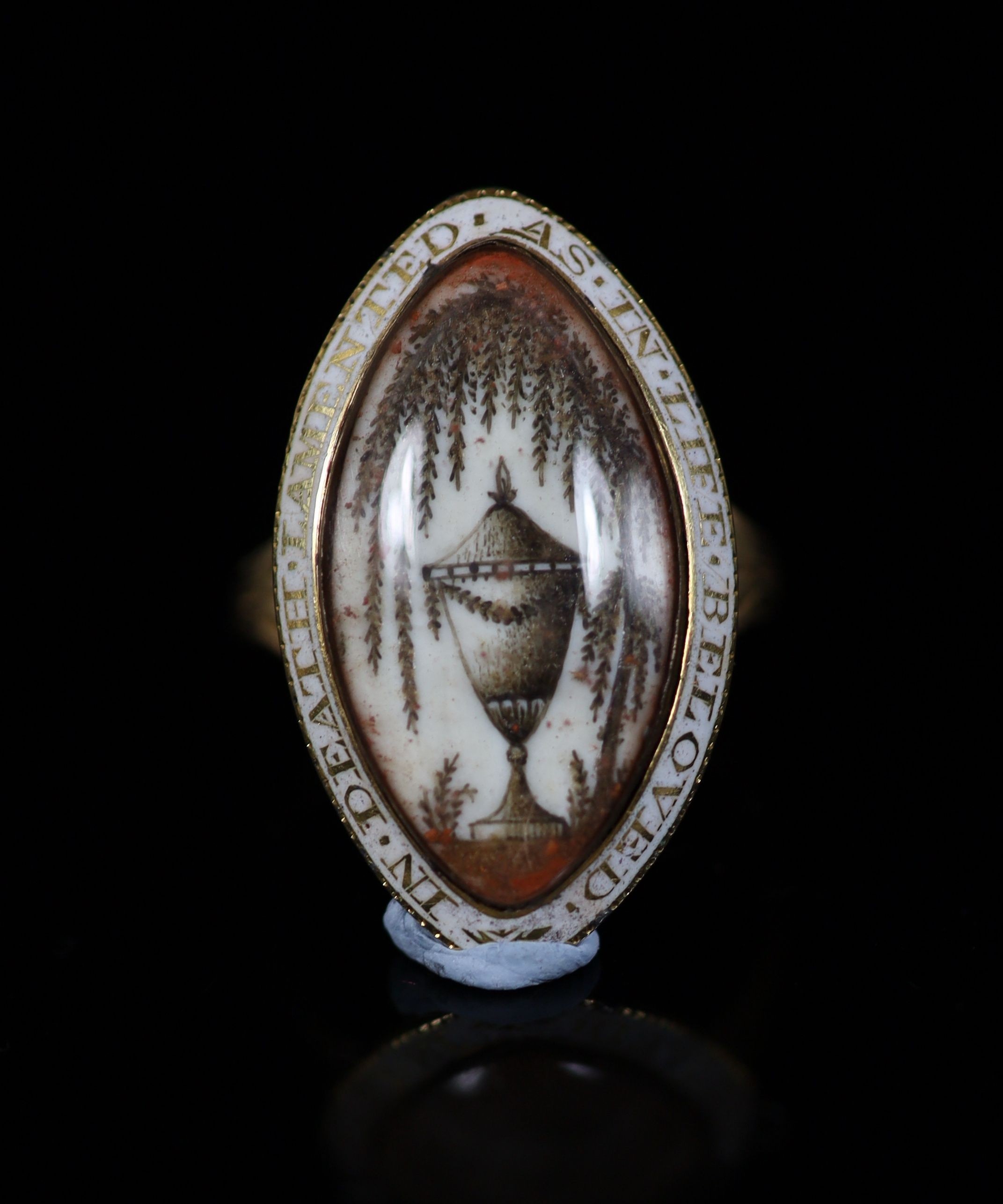 A George III enamelled gold memorial ring, inset with an ivory plaque